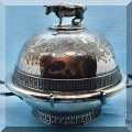 S44. Silverplate serving dish with cow. 